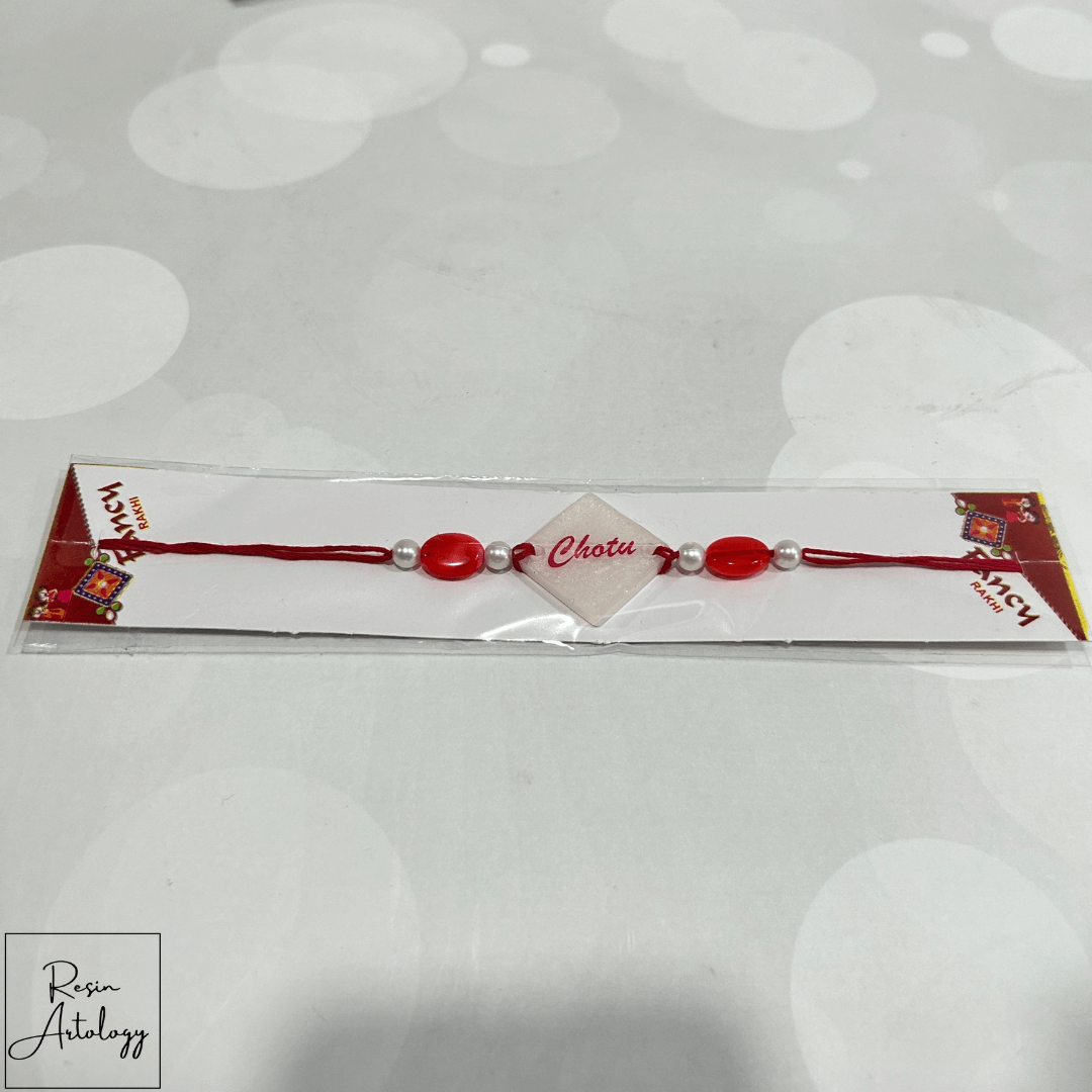 Resin Customised Name Rakhi for Rakshabandhan ( pearl White )