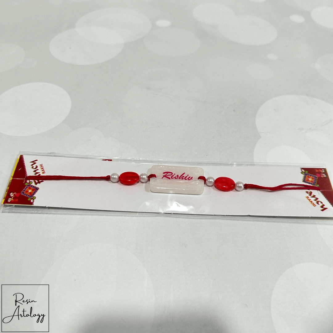 Resin Customised Name Rakhi for Rakshabandhan ( pearl White )