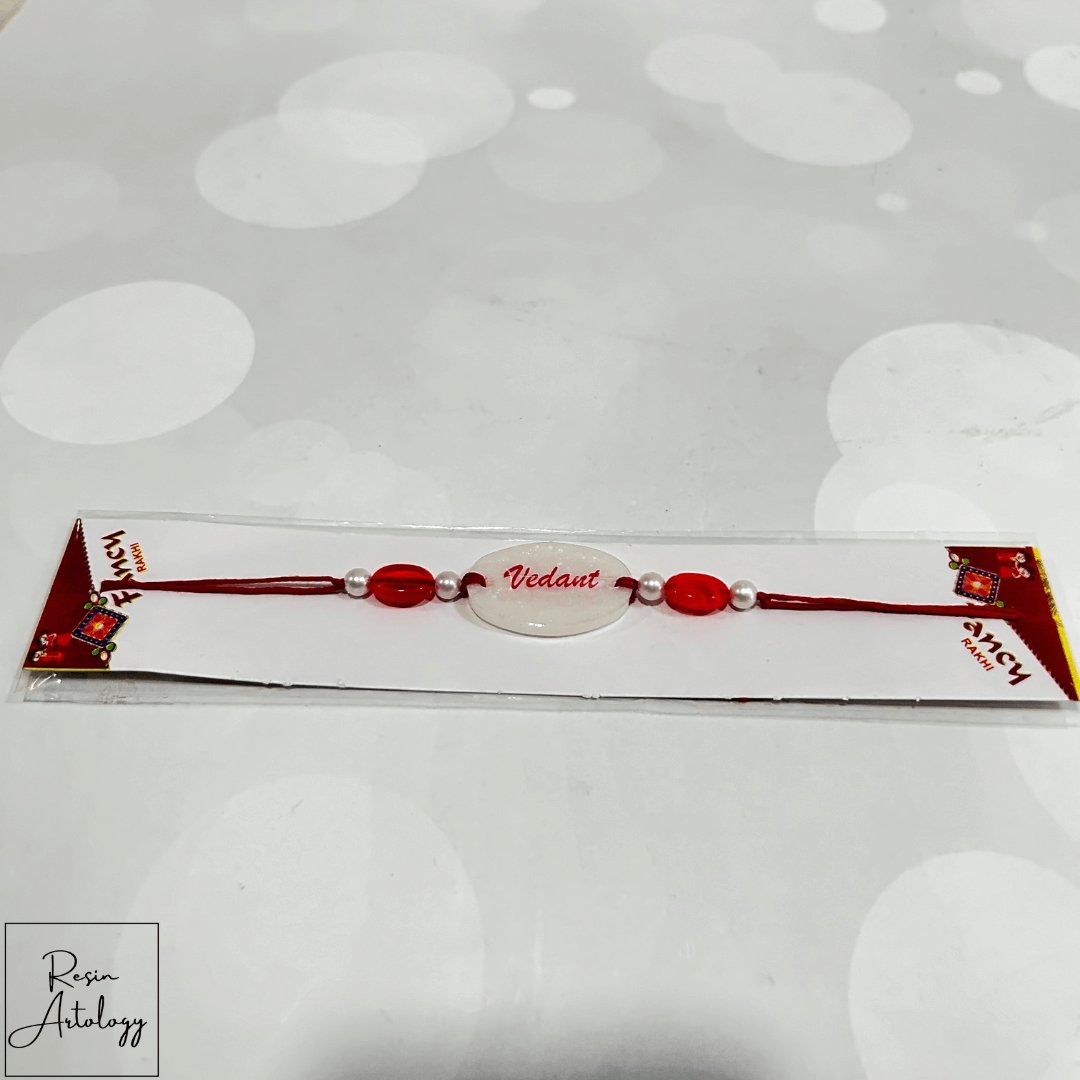 Resin Customised Name Rakhi for Rakshabandhan ( pearl White )