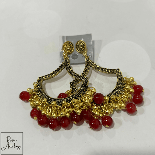 JHUMKA'S RED RA-1 Earrings featuring gold accents and vibrant red beads for traditional elegance.
