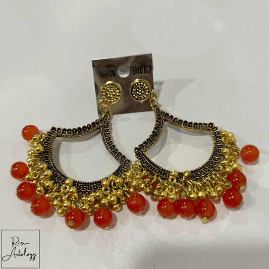 JHUMKA'S ORANGE RA-1 EARRINGS with gold accents and red beads, perfect for festive occasions.