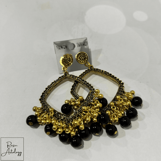 JHUMKA'S BLACK RA-2 EARRINGS featuring elegant gold design and black accents, ideal for festive occasions and parties.