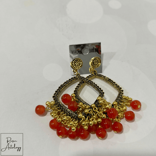 JHUMKA'S ORANGE RA-2 Earrings featuring vibrant orange and golden details, perfect for festive occasions.