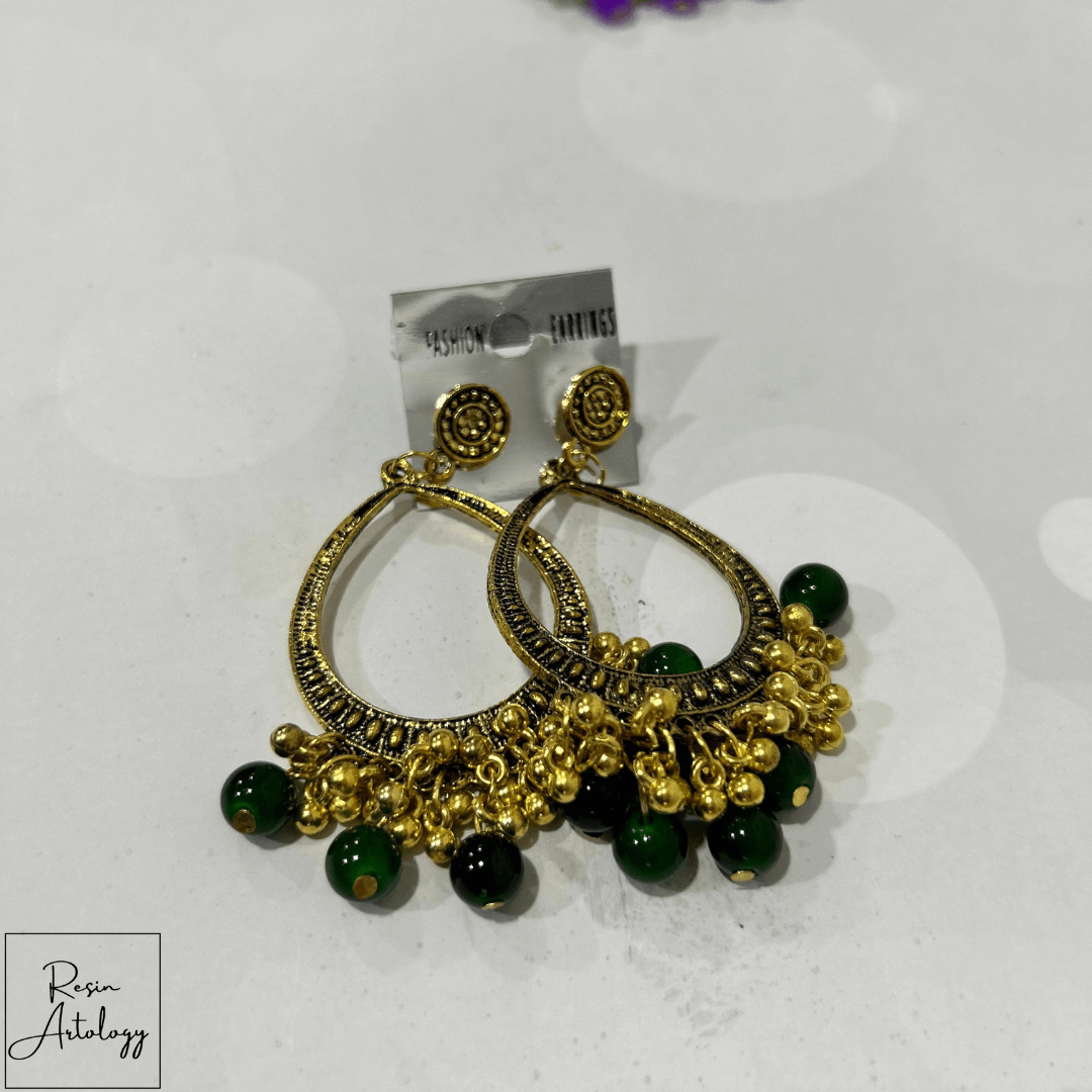 JHUMKA'S DARK GREEN RA-3 earrings featuring traditional design with gold accents and dark green beads.