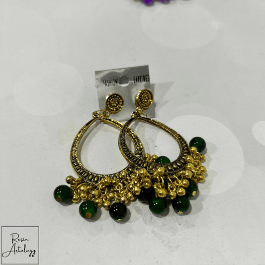JHUMKA'S DARK GREEN RA-3 earrings featuring traditional design with gold accents and dark green beads.