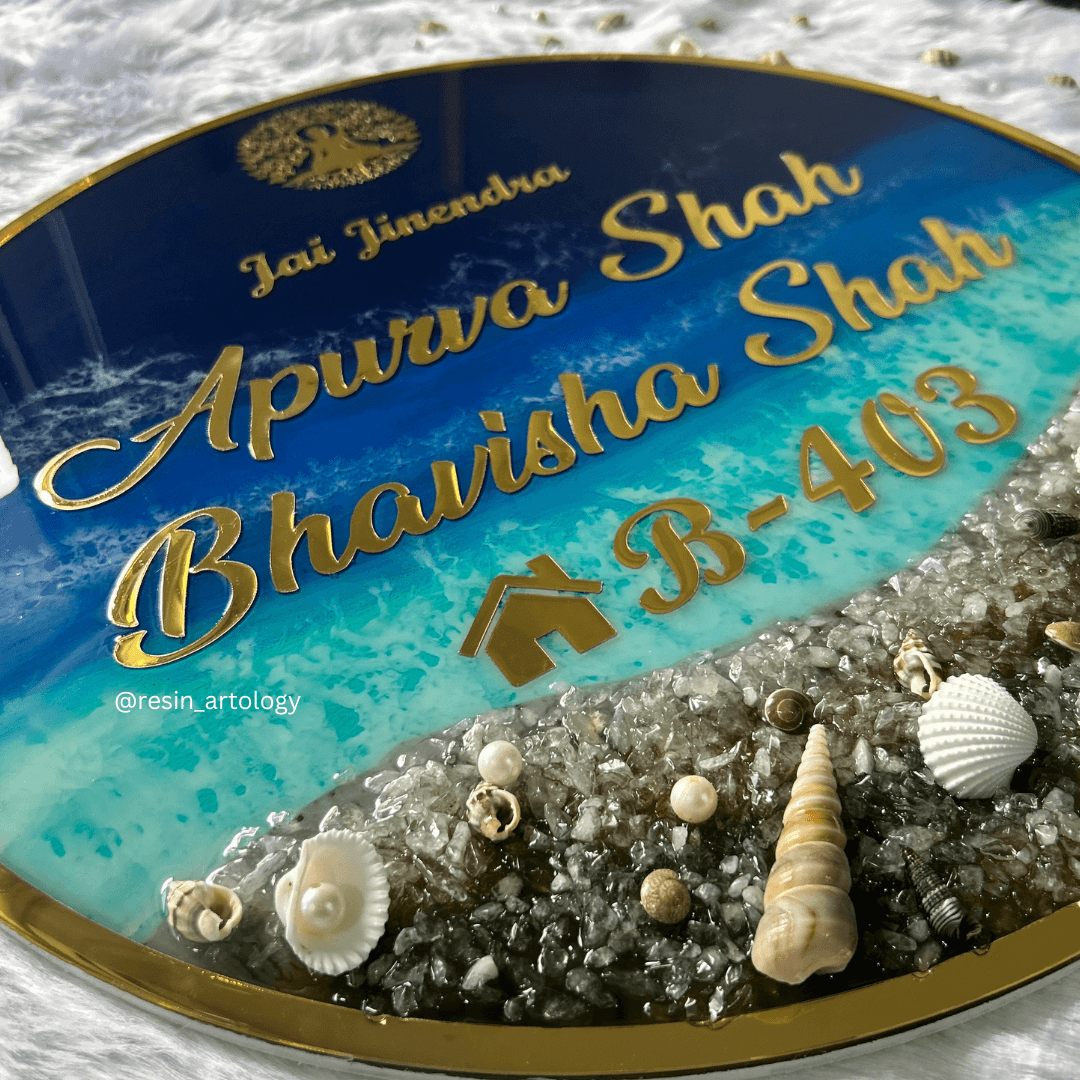 Resin Customized Name Plate featuring personalized names and decorative elements with a beach theme.